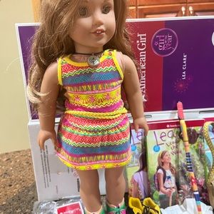 American girl - Lea Clarke with extra outfits and accessories.